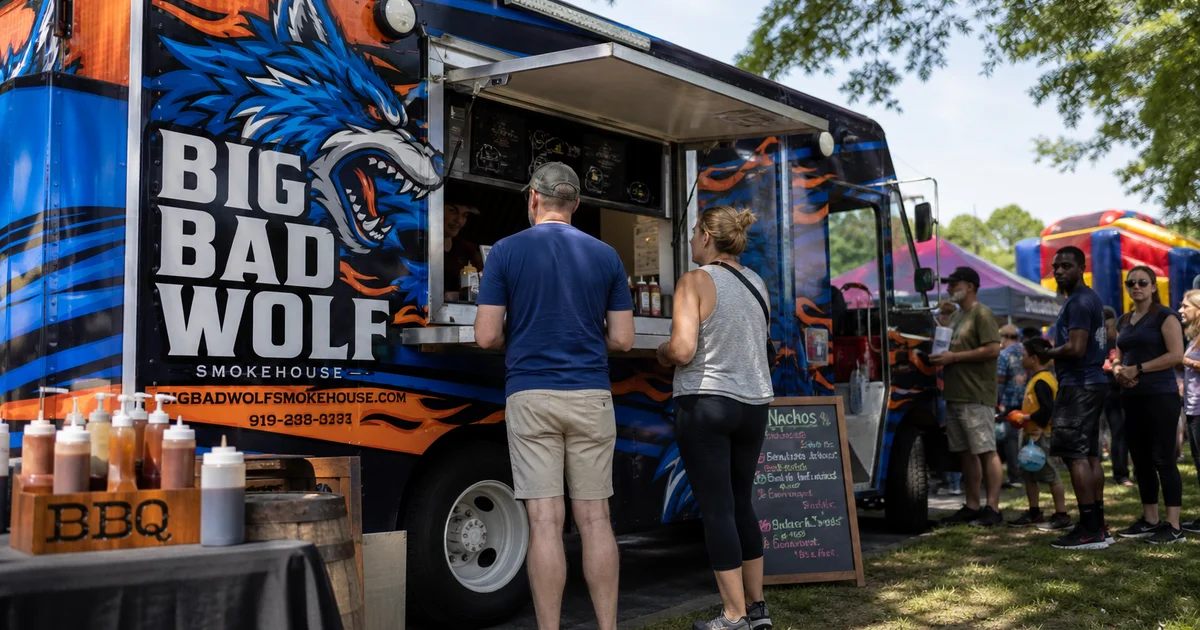 A colorful custom food truck at a North Carolina festival
